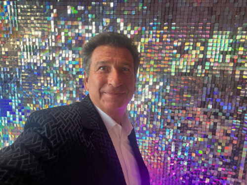 Corporate comedy hypnotist Boris Cherniak presenting at TEDx conference