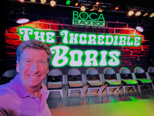 Comedy hypnotist Boris Cherniak performing live on stage